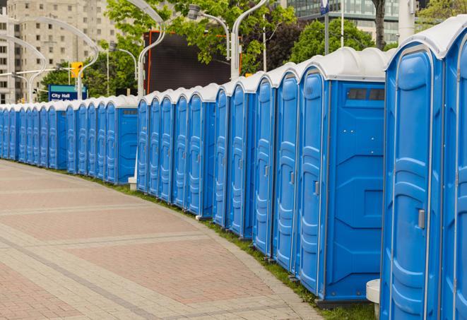 a row of portable restrooms at a fairground, offering visitors a clean and hassle-free experience in Descanso